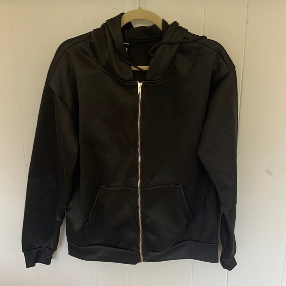 A black jacket from SHEIN. Size medium. Never worn